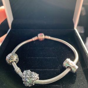 Pandora bracelet with three charms